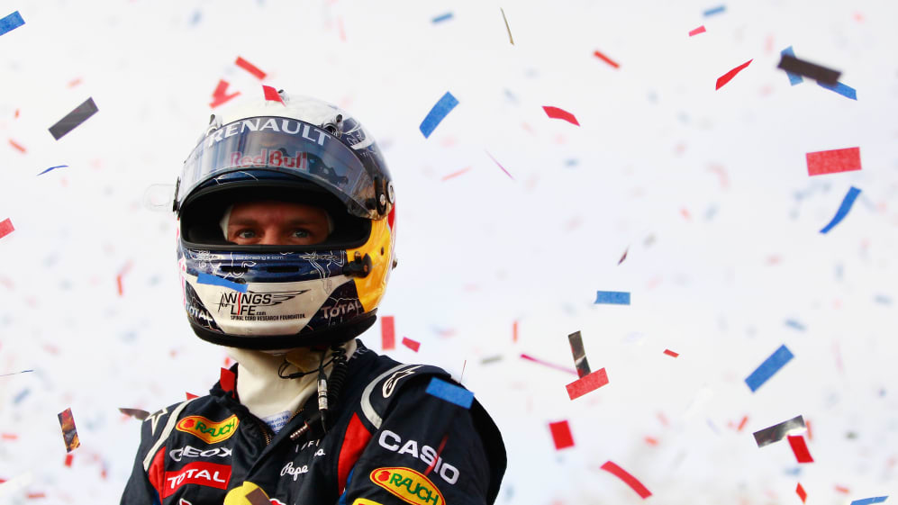 MILTON KEYNES, ENGLAND - DECEMBER 10: Sebastian Vettel of Germany and Red Bull Racing acknowledges
