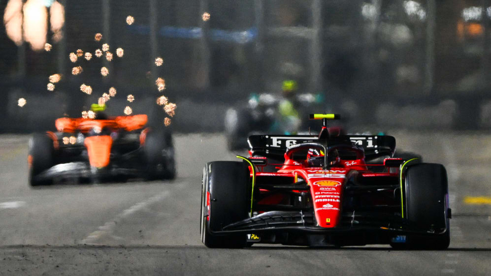 Carlos Sainz leads Lando Norris in Singapore.