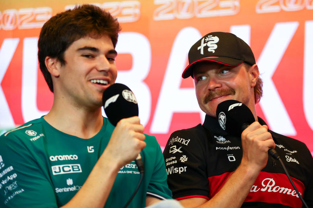 BAKU, AZERBAIJAN - APRIL 27: Lance Stroll of Canada and Aston Martin F1 Team and Valtteri Bottas of