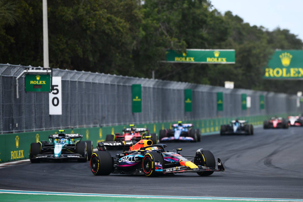 MIAMI, FLORIDA - MAY 07: Sergio Perez of Mexico driving the (11) Oracle Red Bull Racing RB19 leads