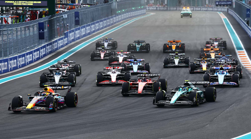 MIAMI, FLORIDA - MAY 07: Sergio Perez of Mexico driving the (11) Oracle Red Bull Racing RB19 leads