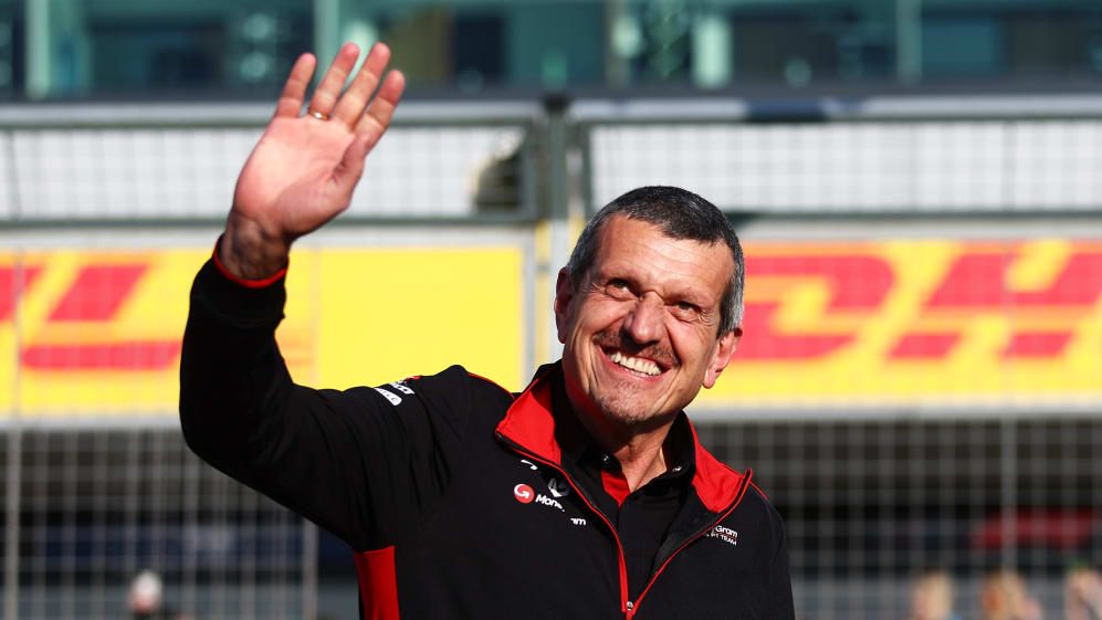 NORTHAMPTON, ENGLAND - JULY 06: Haas F1 Team Principal Guenther Steiner waves to the crowd during