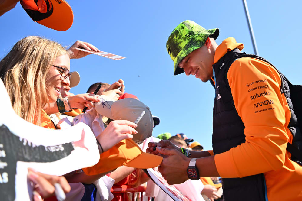 NORTHAMPTON, ENGLAND - JULY 07: Lando Norris of Great Britain and McLaren greets fans as he arrives