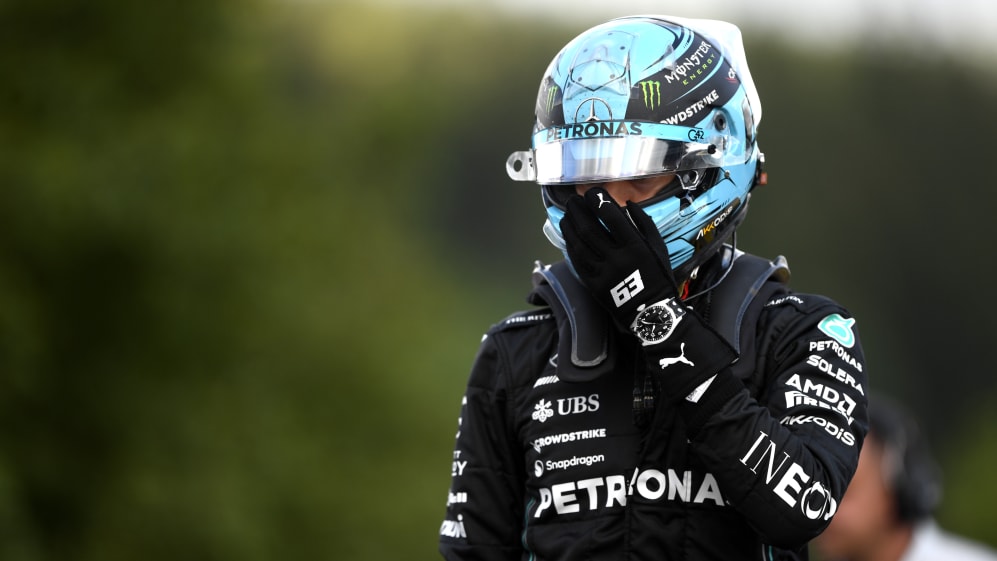 SPA, BELGIUM - JULY 28: 8th placed qualifier George Russell of Great Britain and Mercedes walks in