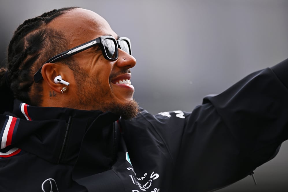 SPA, BELGIUM - JULY 30: Lewis Hamilton of Great Britain and Mercedes waves to the crowd on the