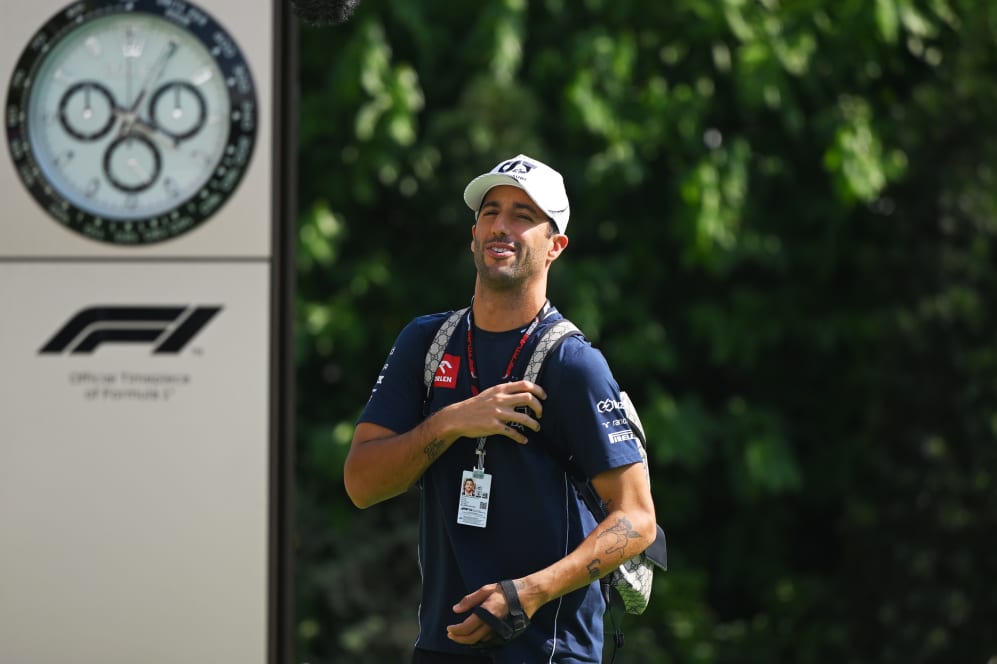 SINGAPORE, SINGAPORE - SEPTEMBER 15: Daniel Ricciardo of Australia and Scuderia AlphaTauri walks in