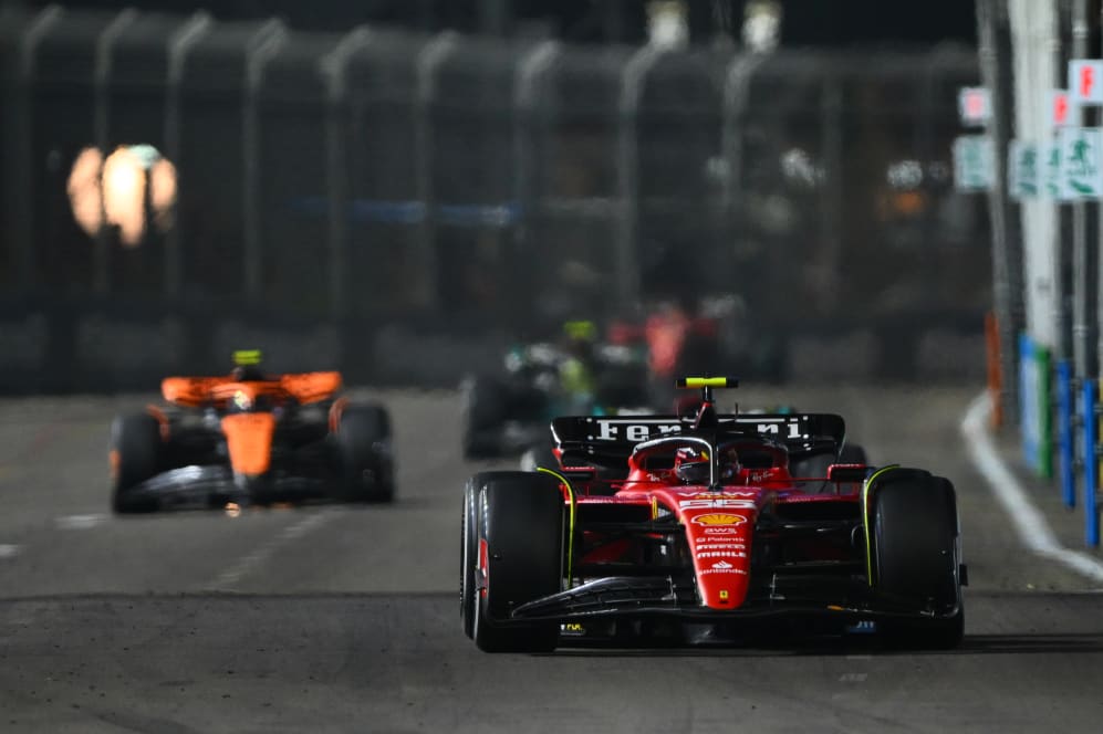 SINGAPORE, SINGAPORE - SEPTEMBER 17: Carlos Sainz of Spain driving (55) the Ferrari SF-23 on track