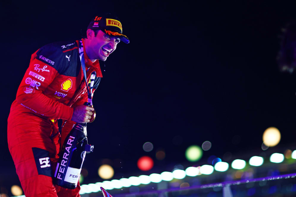 SINGAPORE, SINGAPORE - SEPTEMBER 17: Race winner Carlos Sainz of Spain and Ferrari celebrates on