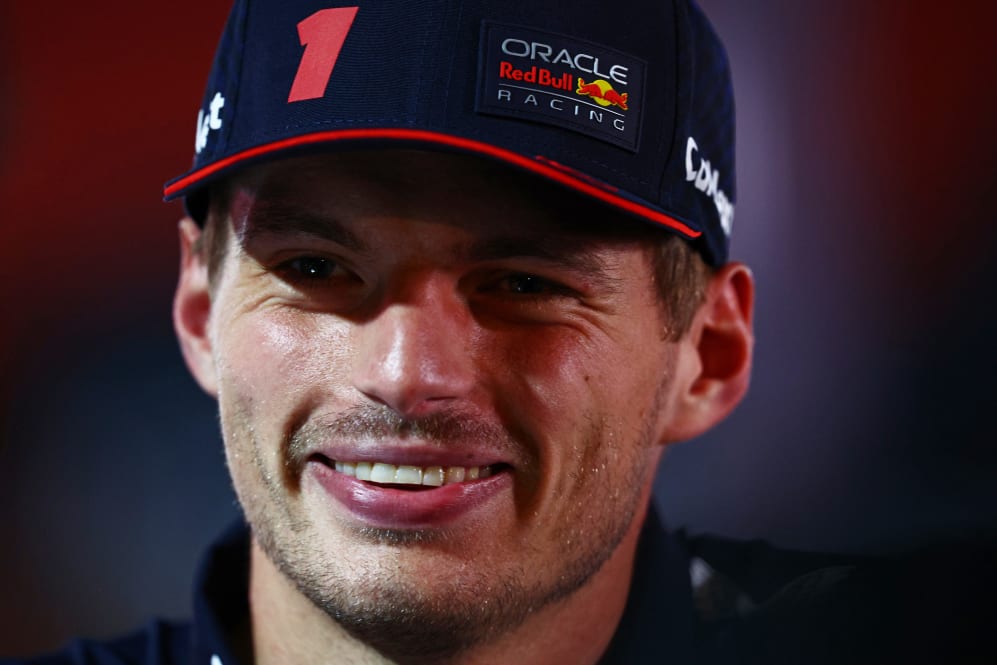 LUSAIL CITY, QATAR - OCTOBER 05: Max Verstappen of the Netherlands and Oracle Red Bull Racing talks