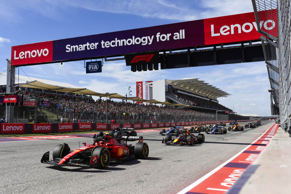 AUSTIN, TEXAS - OCTOBER 22: Carlos Sainz of Spain driving (55) the Ferrari SF-23 leads Max